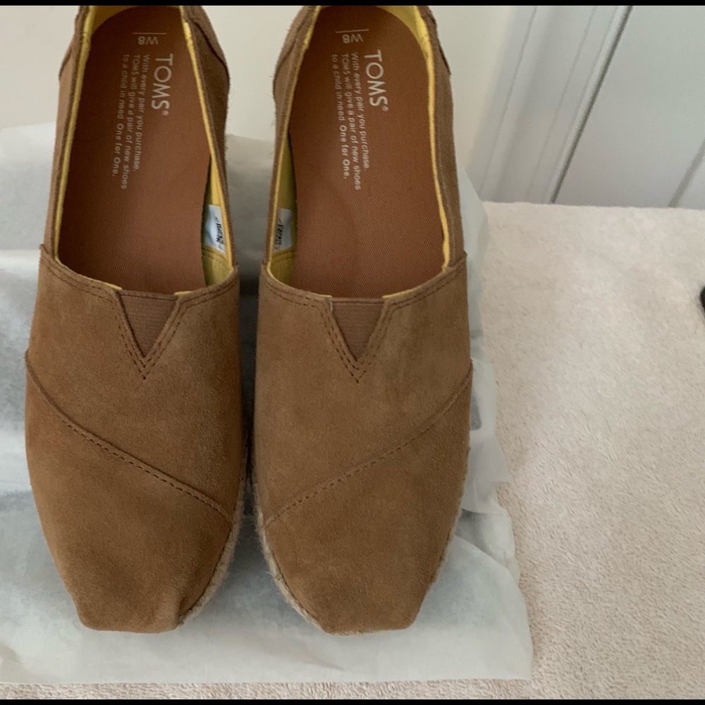 Tom’s suede shoes